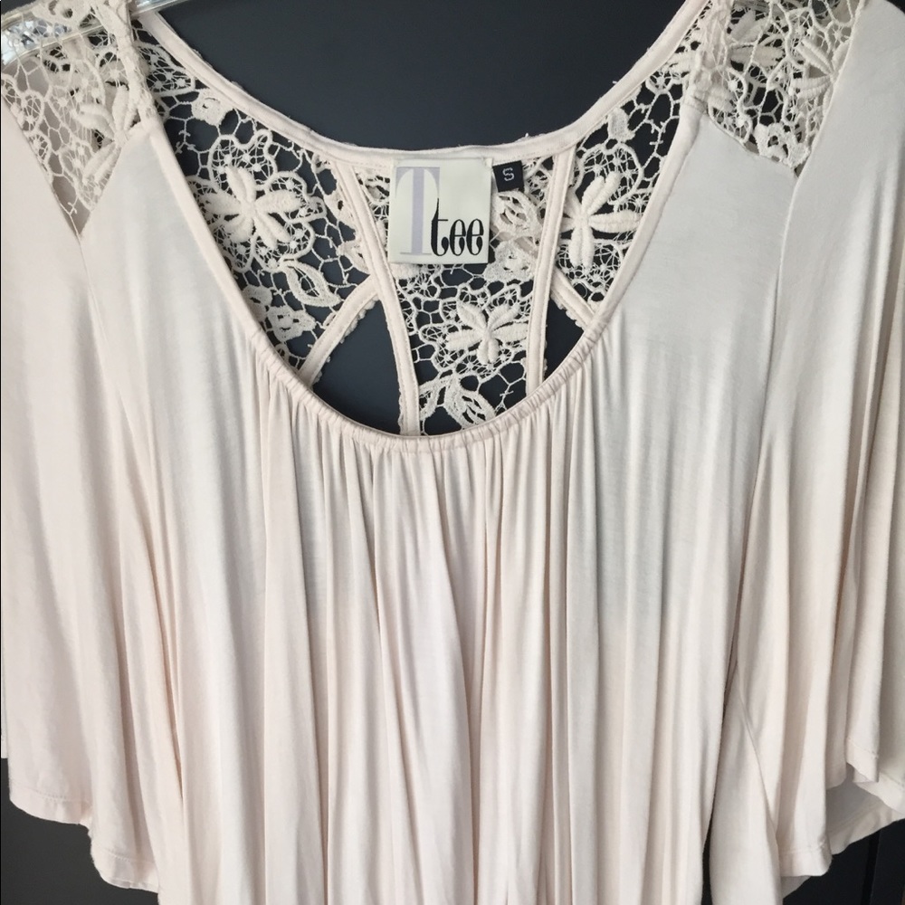 Flowy tee with embellished back.